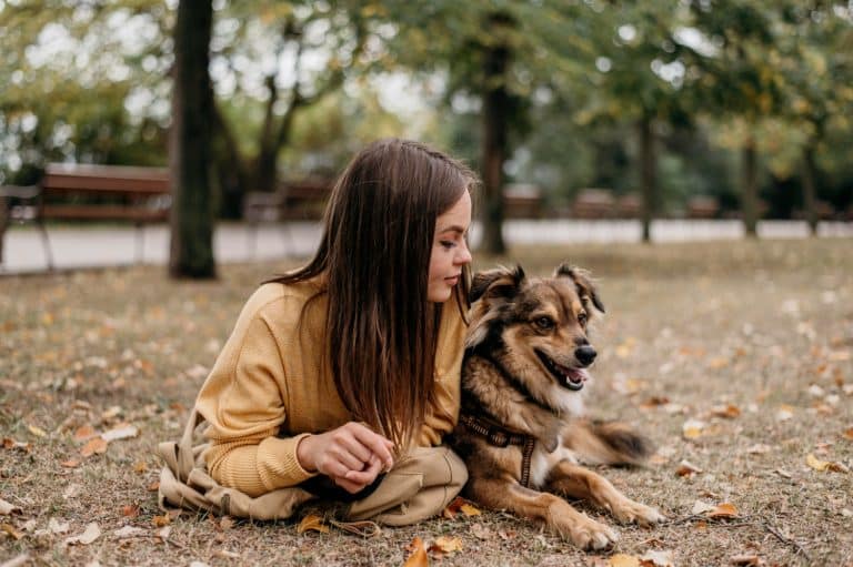 woman with dog outside